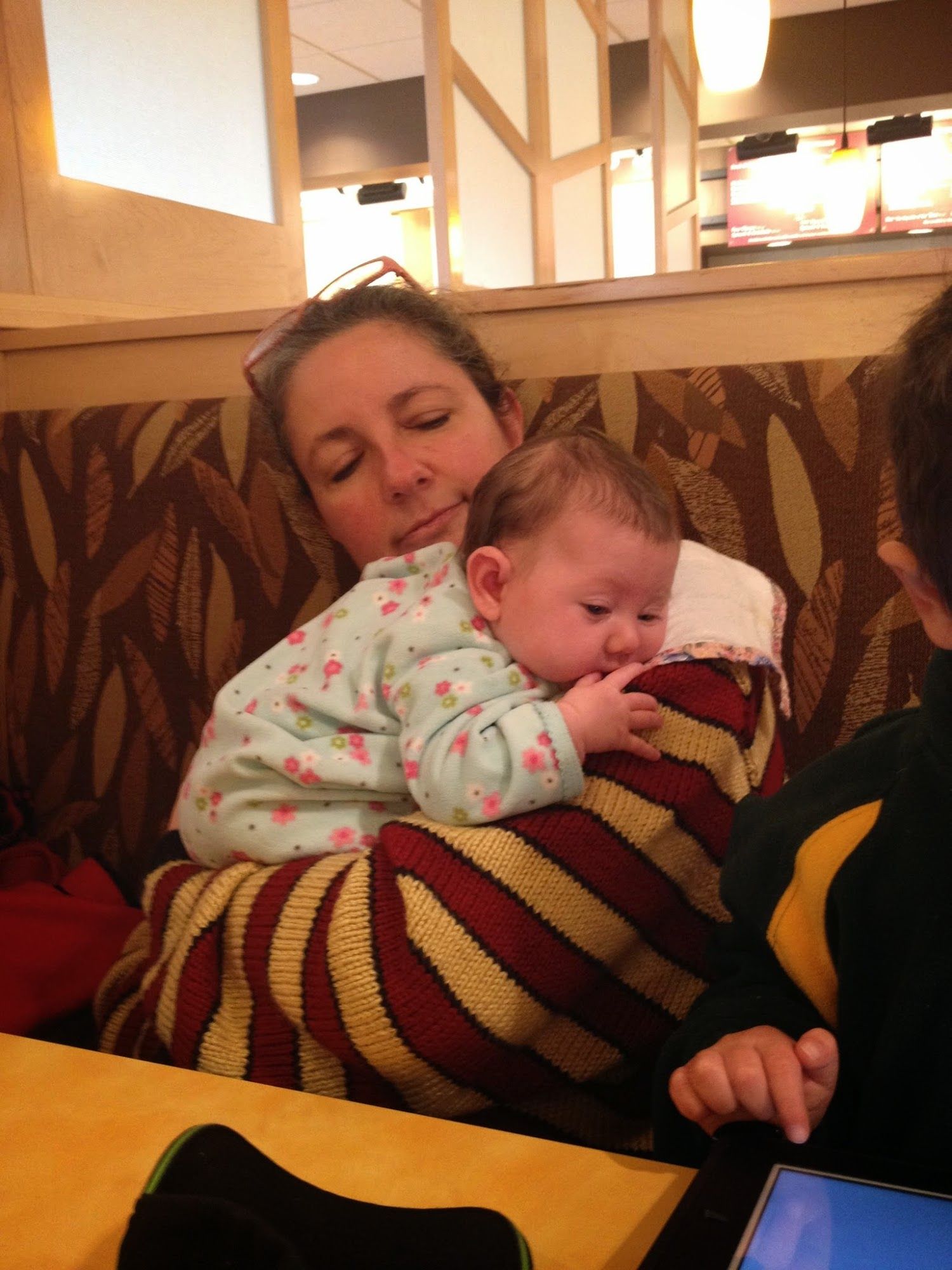 Bean snuggling with Mrs. M during our almost weekly breakfast.
