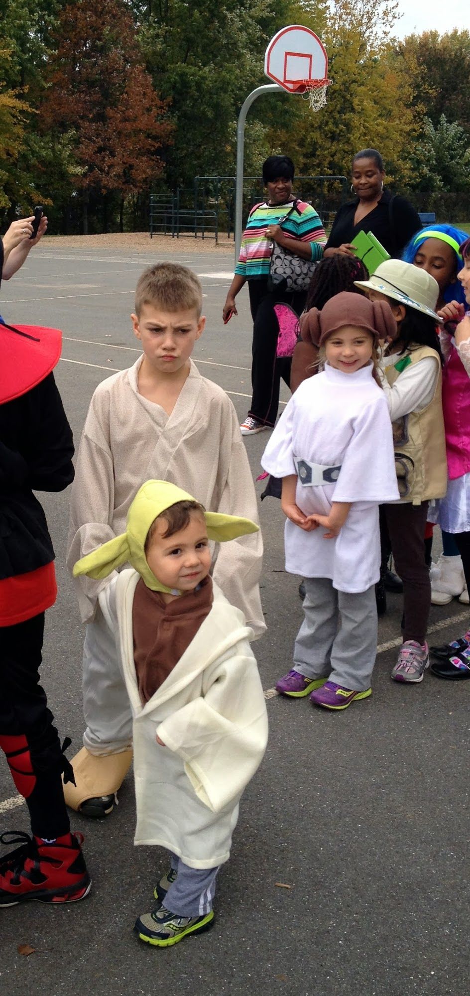 A Grumpy Luke with an oblivious Yoda and Princess Leia.Fortunately, he lightened up once the party started :)