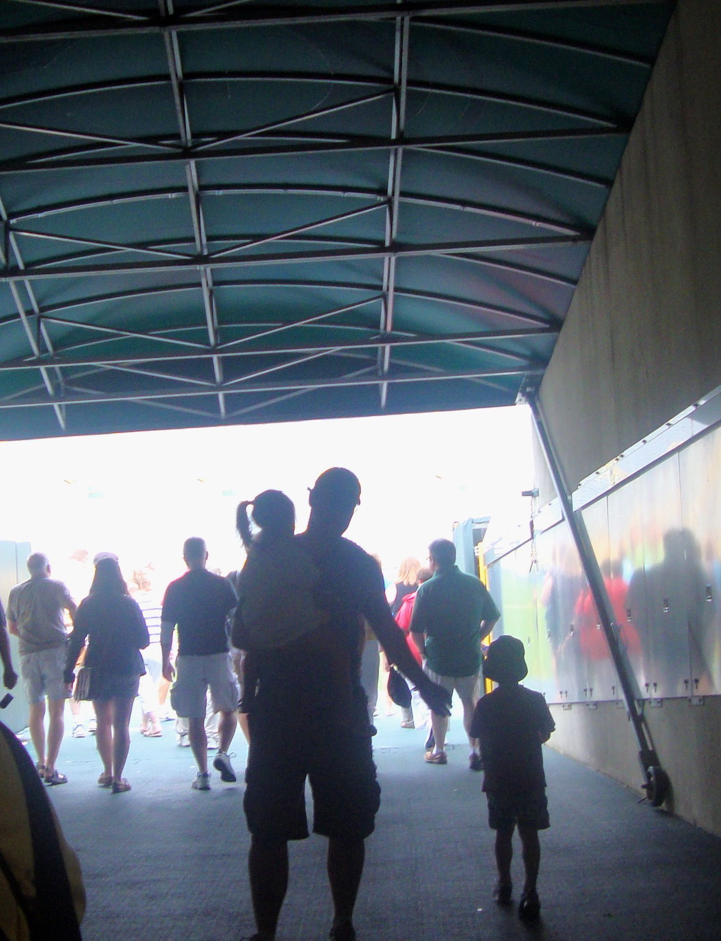 Hubby, Bug, and Boogs. When we walked through the tunnel where the players go through to be presented, the tour guide played a sound effect that sounded like fans were cheering for us. I told Boogs that people heard he was there and they were excited to see him. It was very cool. He loved it!