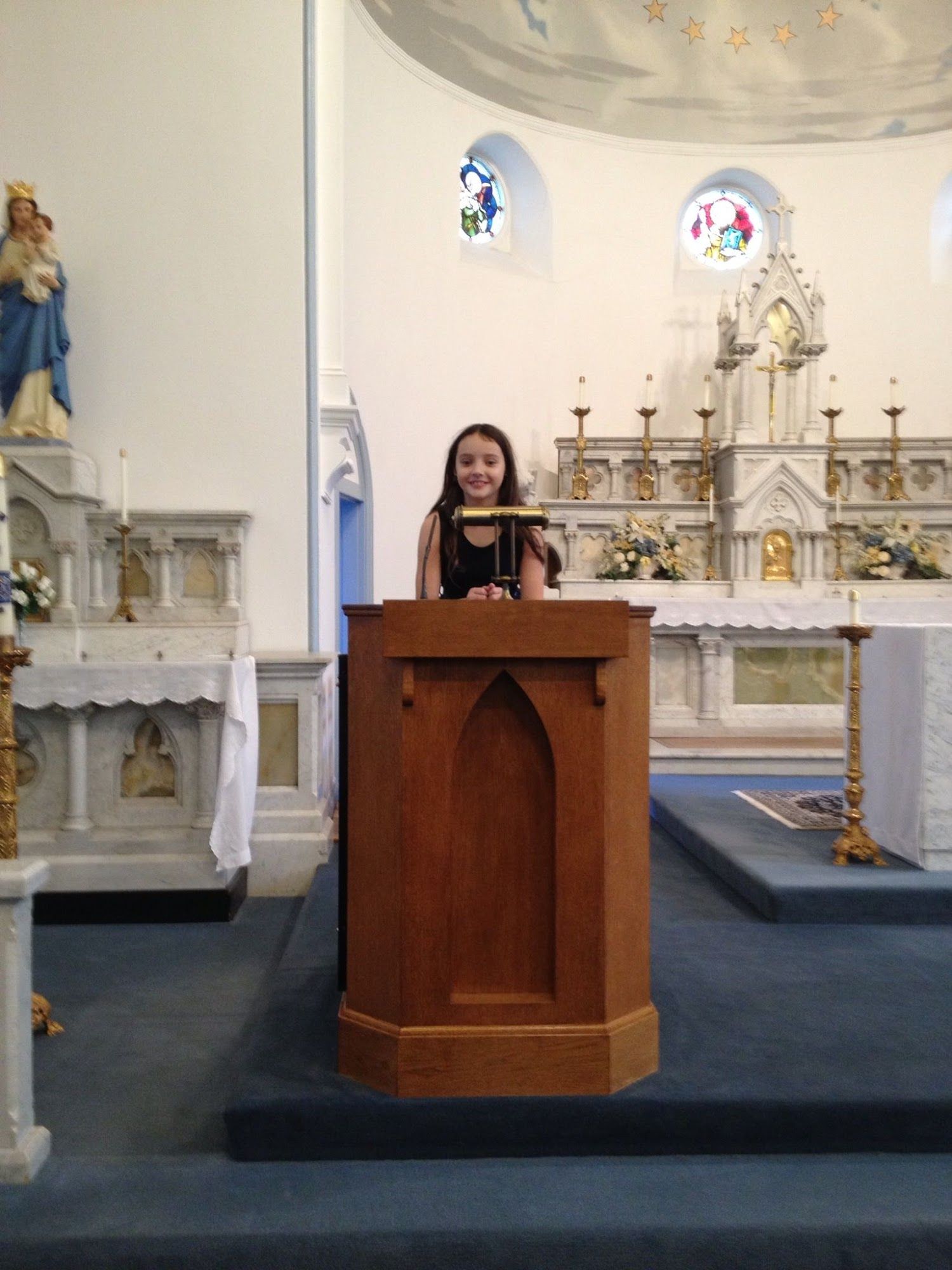 Baby Pumpkin's sister who did the reading for her baptism.