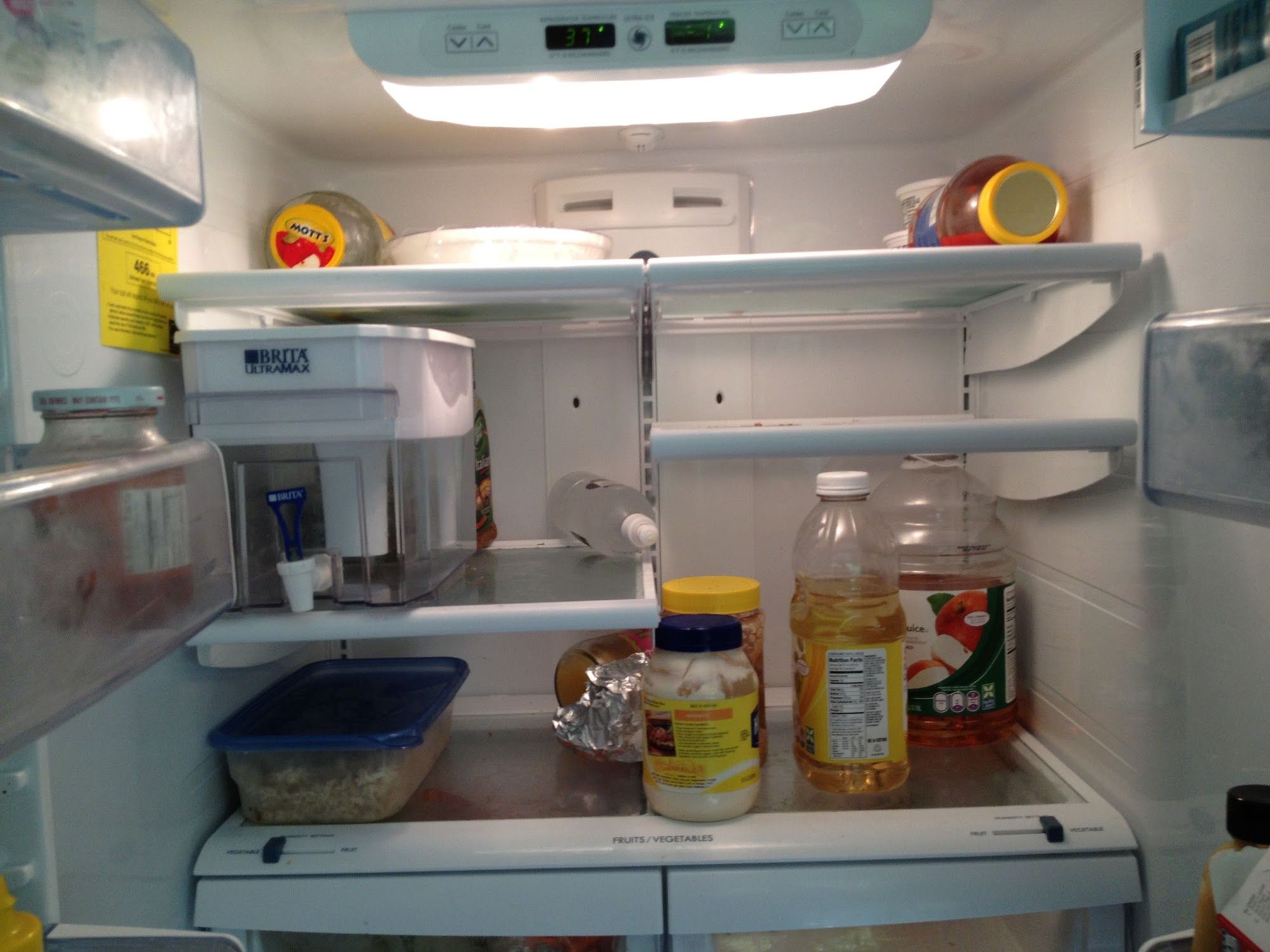 My nearly empty refrigerator due to a broken defrost control board