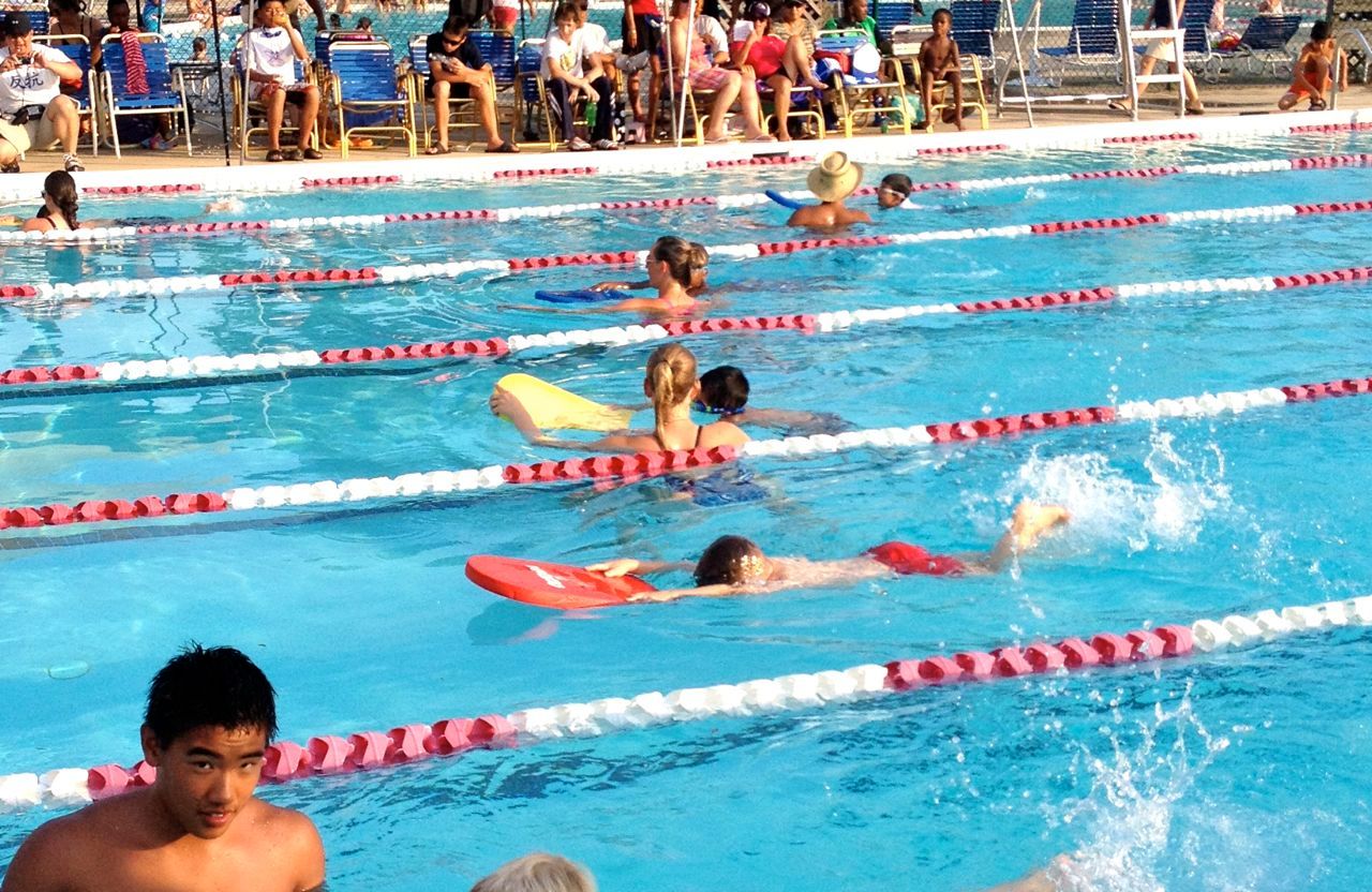 Boogie swimming hard in the kickboard race without a coach in his lane :)