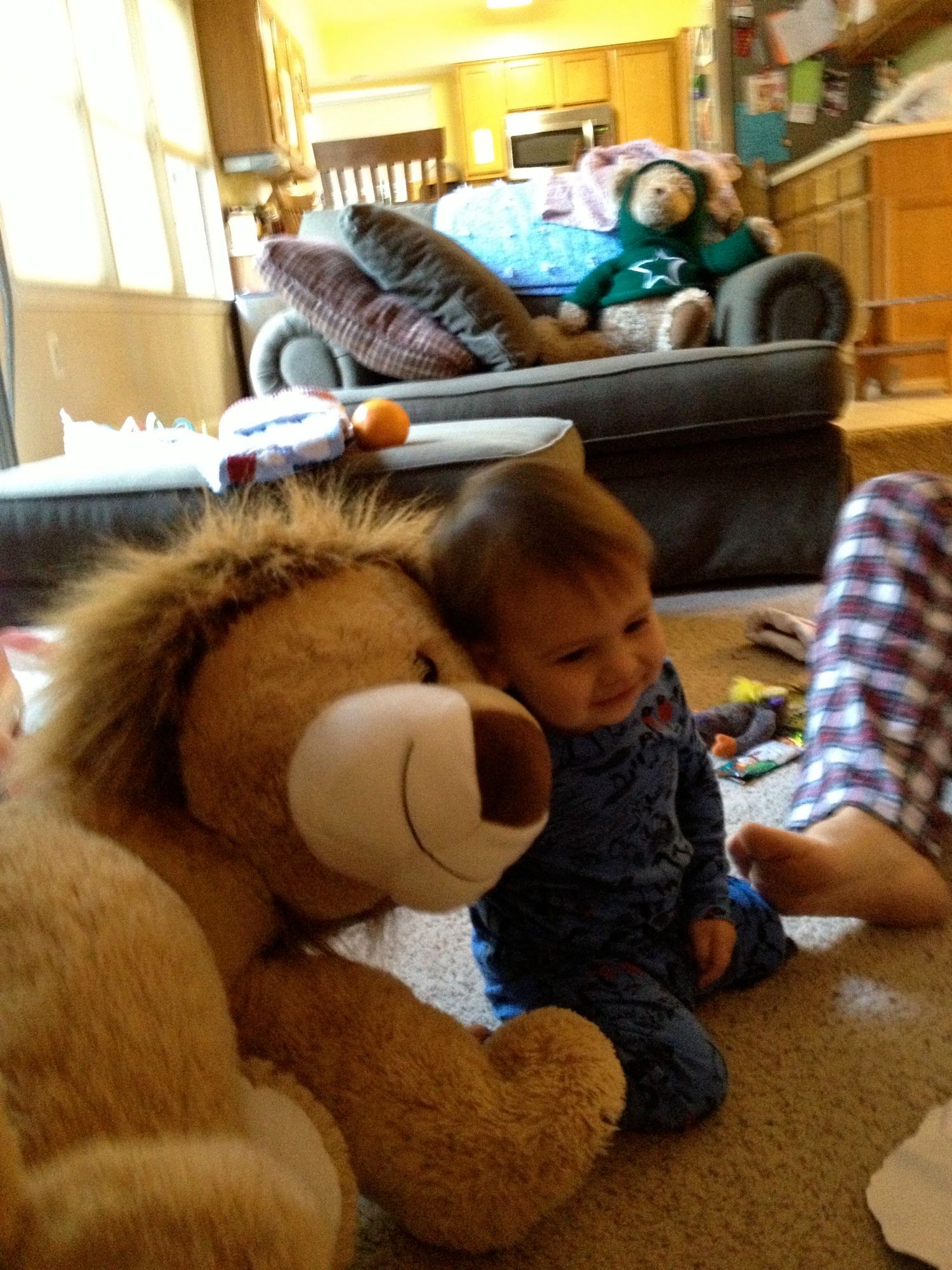 Enjoying his sibling gift,