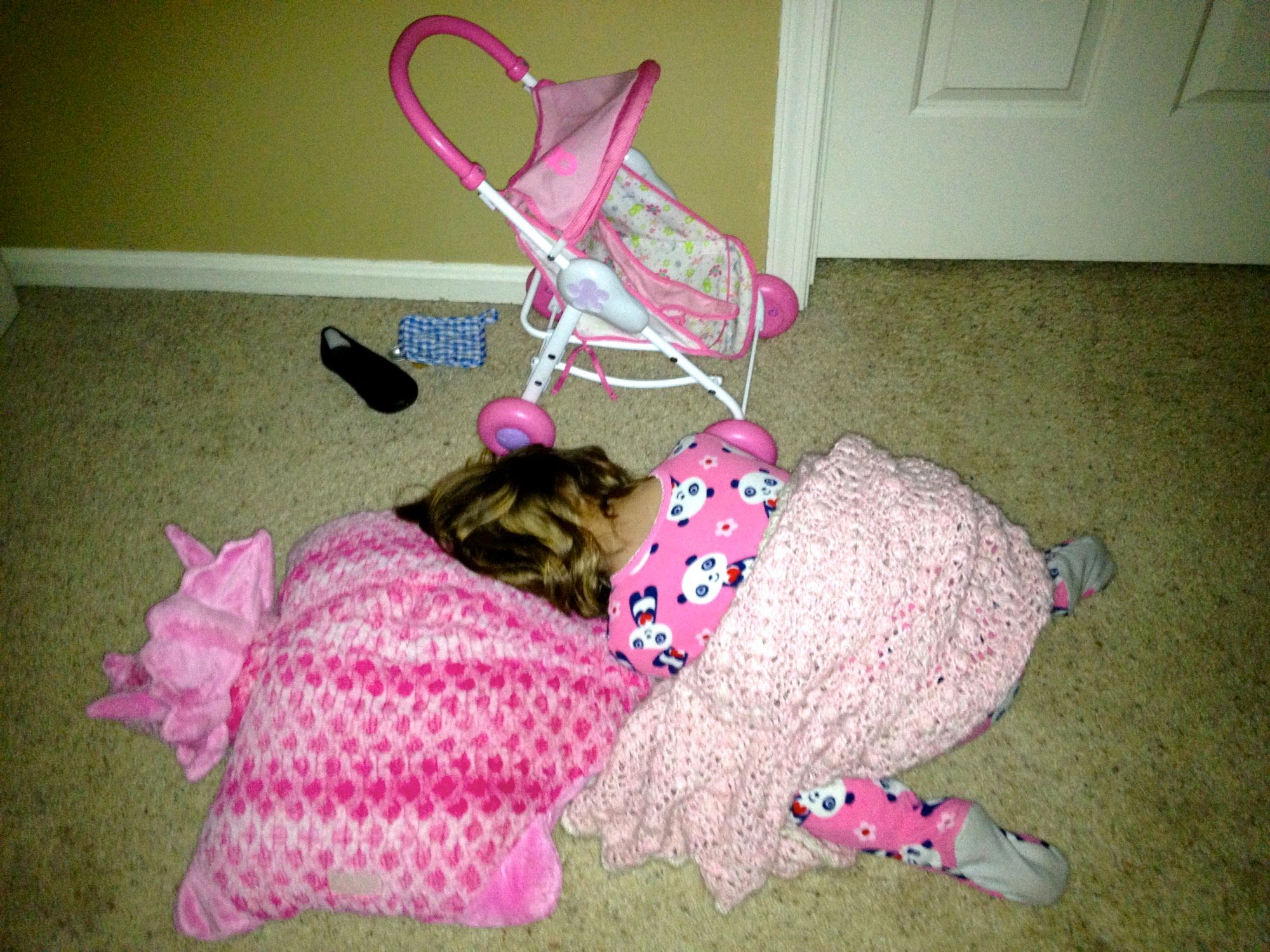  In the upstairs hallway between all 3 bedrooms.This is because I told her that I didn't want to find her in my bed when I came upstairs  to go to bed.Take that, Mommy!She's quite comfortable with her pillow pet and blankie. 