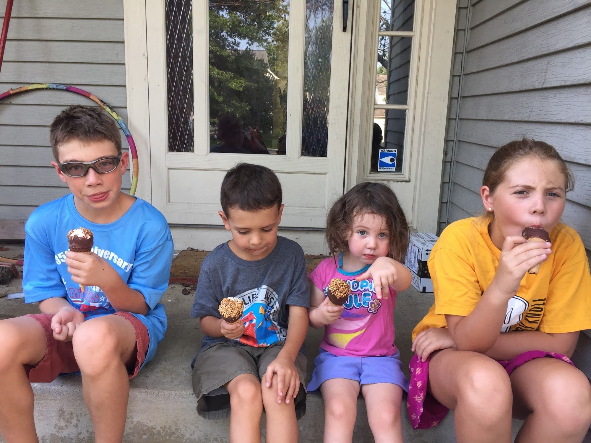 Enjoying an after school ice cream treat.