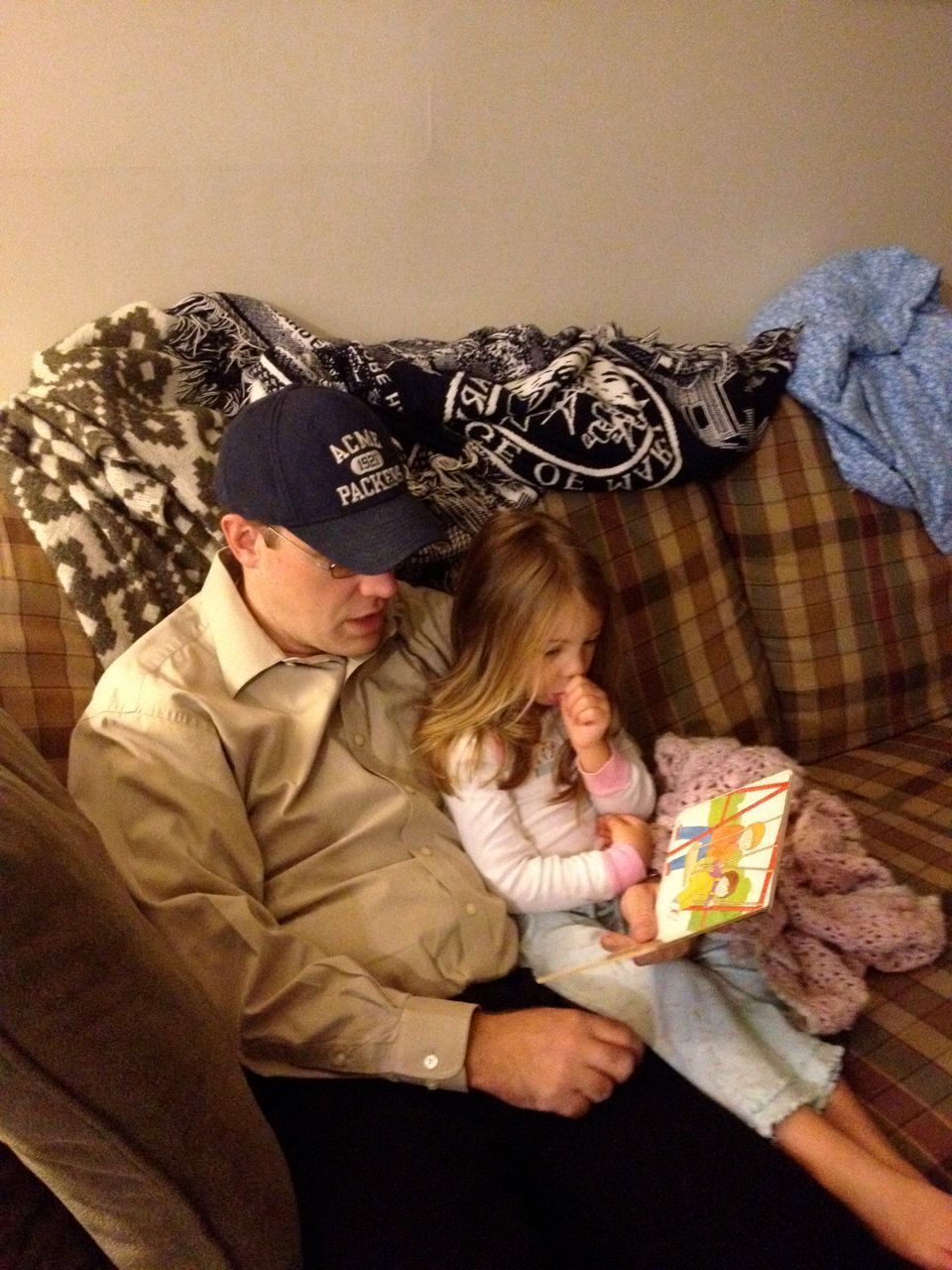  Our early bird squeezed in one more snuggle and one more story before Daddy left for his business trip 