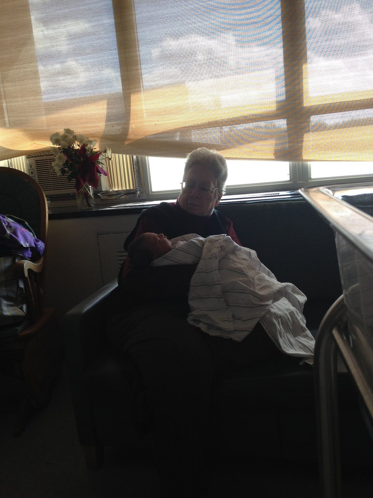 Grandma with her 22nd and last grandchild, Bean.