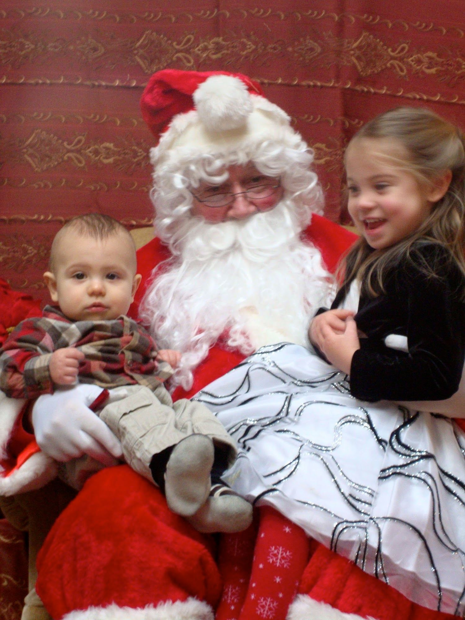Mr. Bananas and Buggy visiting with Santa