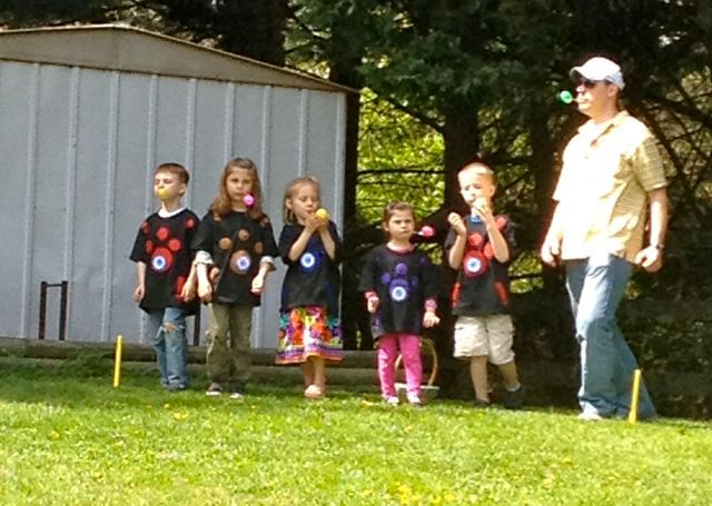 Hubby demonstrating how to play the Platypus Egg Race