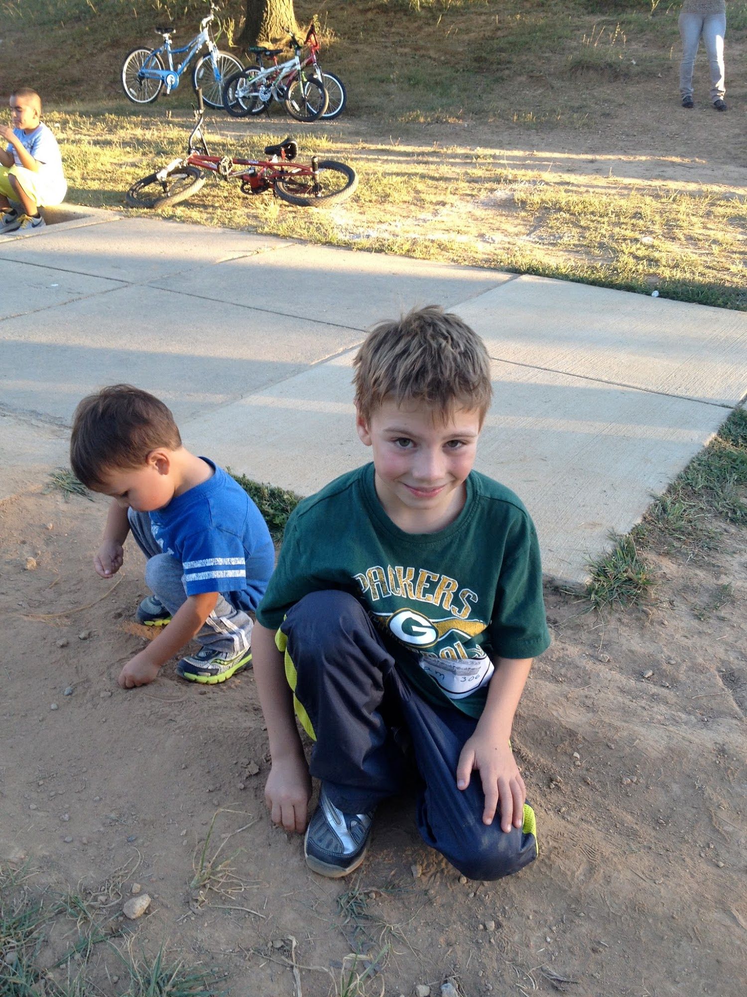  Playing in the dirt after their run 