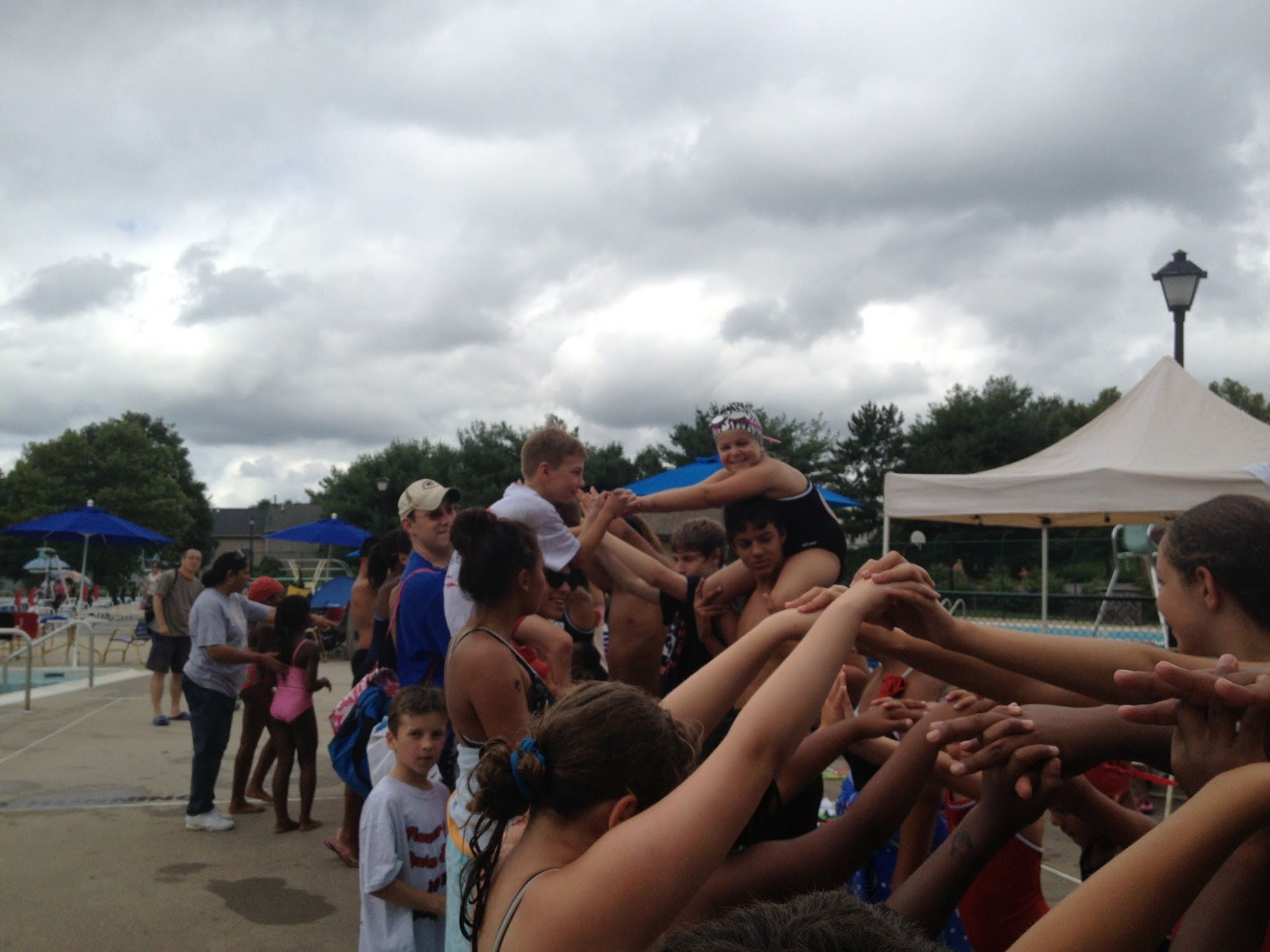  Sending off our seniors. We made a tunnel for them to run through and celebrated their time on swim team 