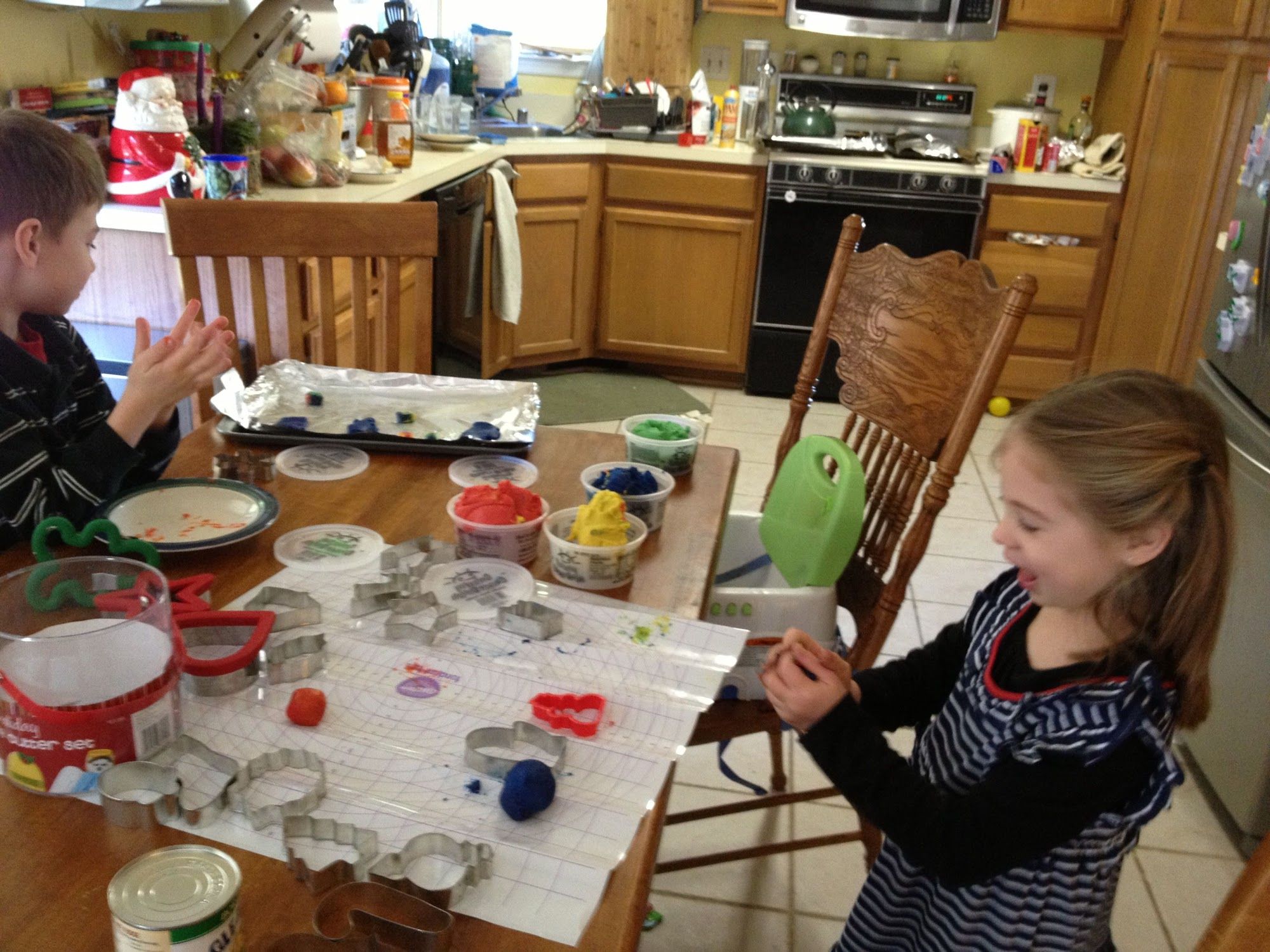 The big kids making cookies for our neighbors