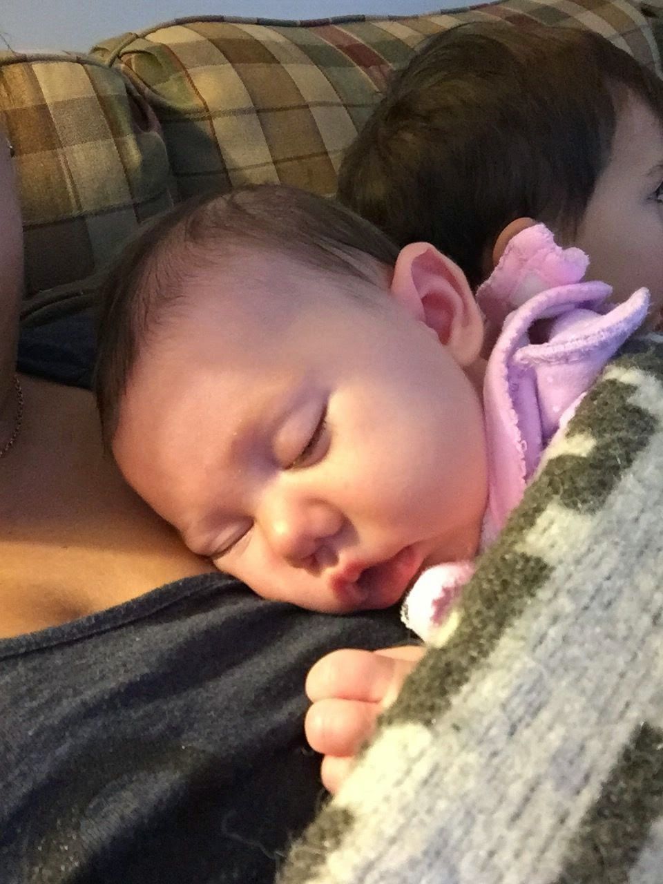 My favorite thing to do with her. I love having her sleep on my chest