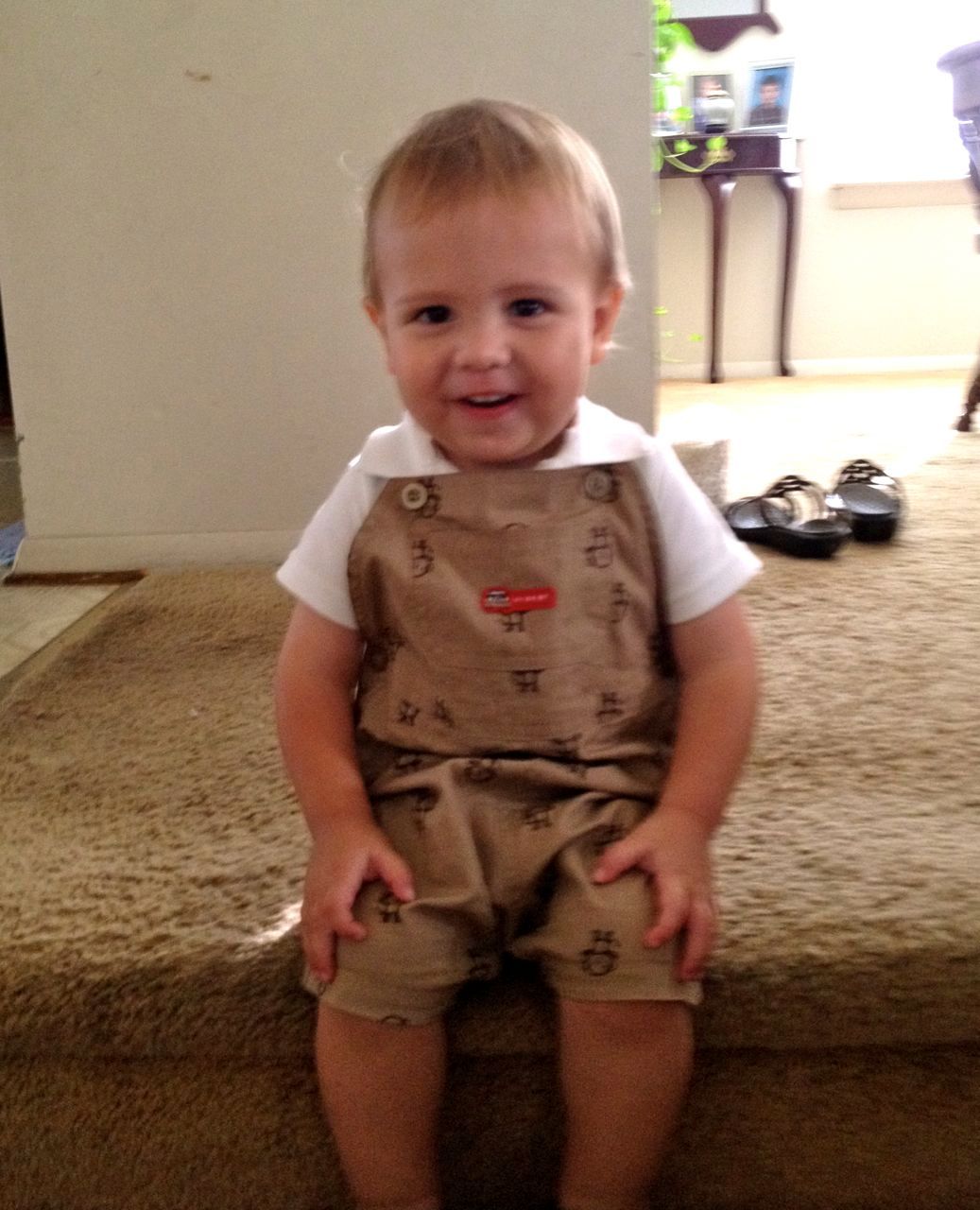  Showing off his outfit from his Godparents 