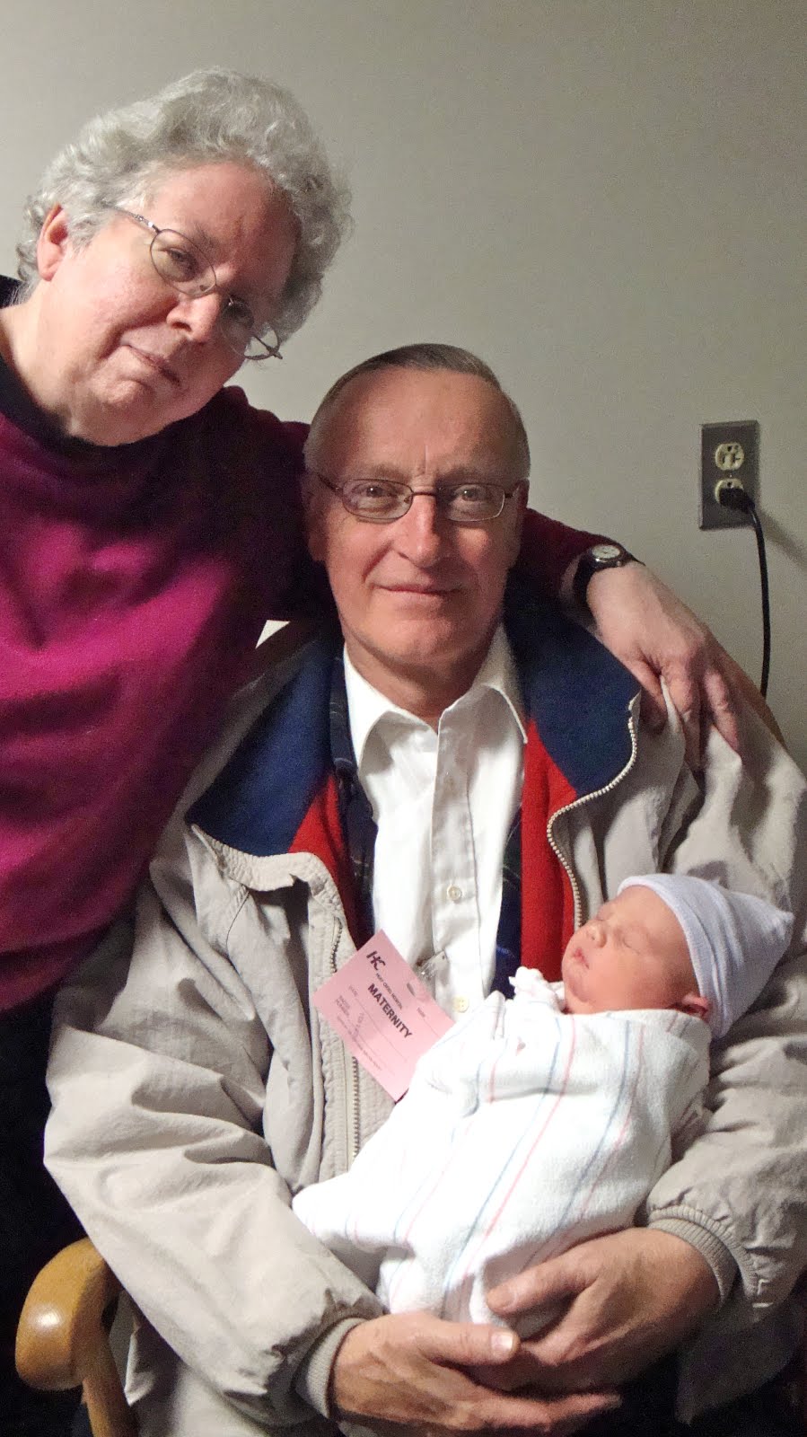 Grandma and Grandpa with their19th grandchild, Mr. Bananas