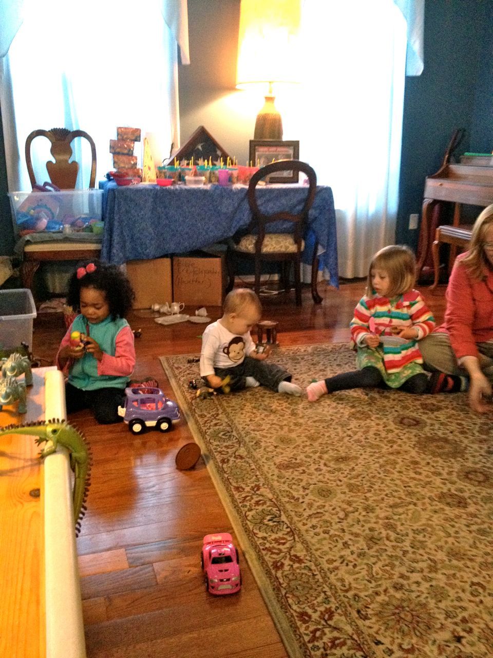 Playing with (around?) his friends.