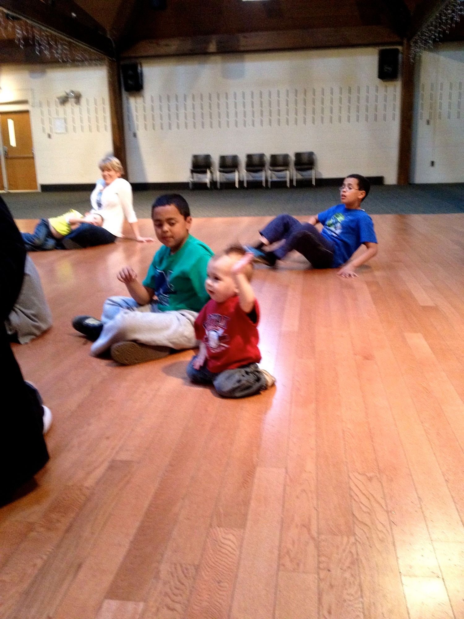  My littlest man raising his hand to share his Lenten promises with Monsignor. 