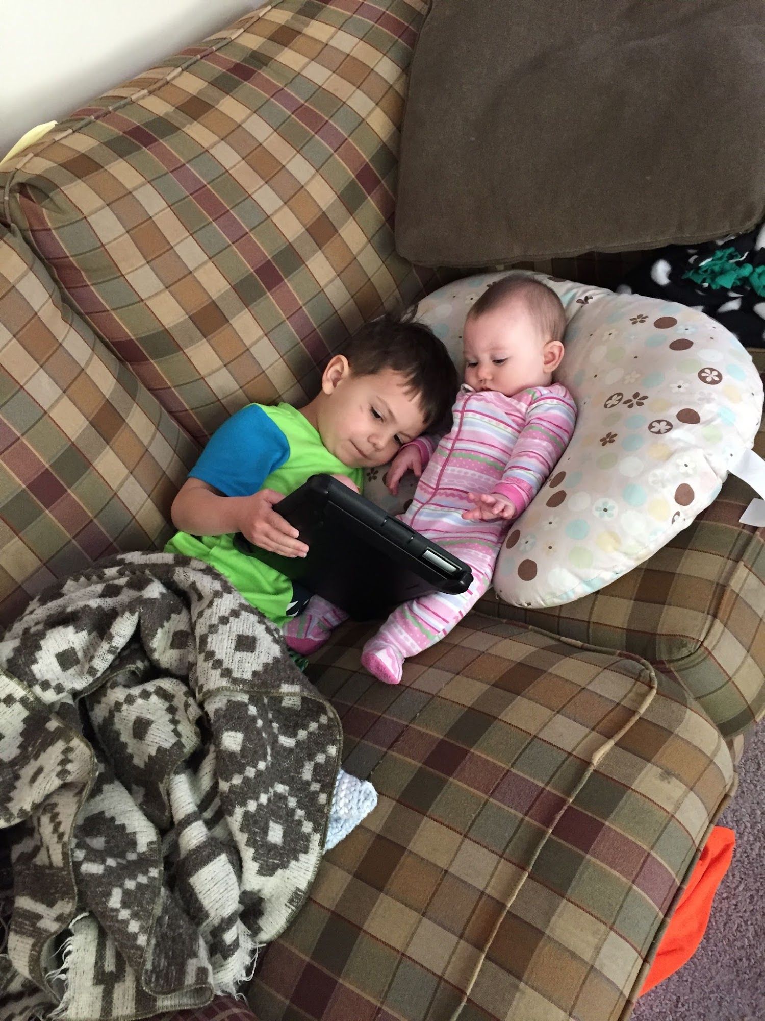  Mr. Bananas and Bean hanging out together.Mr. Bananas loves sharing the iPad with his sister.He really can't get enough of her. 